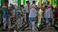 Jemaah calon haji kloter I asal Kabupaten Pati telah tiba di Asrama Haji Donohudan, Boyolali, Jumat (3/6).(Liputan6.com/Fajar Abrori)