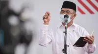 Menko PMK Muhadjir Effendy Menko Muhadjir sampaikan Presiden Jokowi minta sosialisasi COVID-19 menggunakan bahasa dan simbol lokal usai rapat terbatas di Istana Negara, Jakarta, Senin (13/7/2020). (Dok Humas Sekretariat Kabinet)