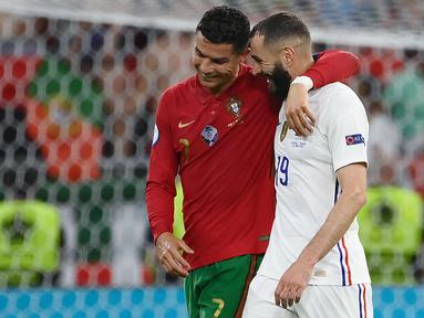 Portugal dan Prancis sama-sama berbagi poin pada laga pamungkas fase Grup F Euro 2020. Dengan hasil ini, baik Portugal maupun Prancis berhasil mentas dari fase grup dan lolos ke babak 16 besar. (Foto: AFP/Pool/Franck Fife)