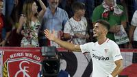 Penyerang Sevilla, Andre Silva, usai mencetak gol ke gawang Real Madrid, di Stadio Ramon Sanchez Pizjuan, Kamis (27/9/2018) dini hari WIB.  (AFP / Cristina Quicler)