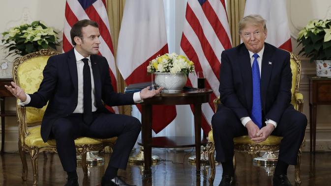 Presiden Donald Trump dan Emmanuel Macron di NATO Summit 2019. Dok: AP