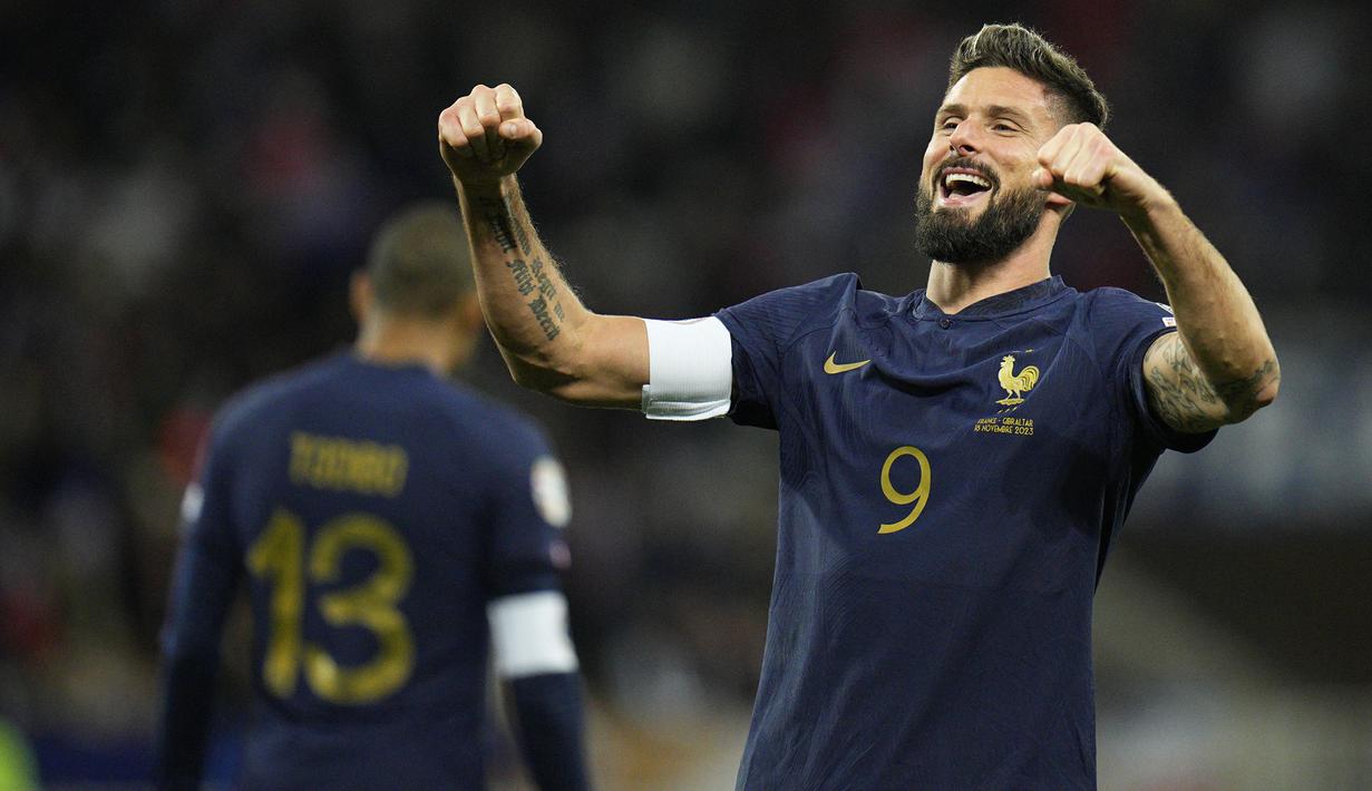 Selebrasi striker Timnas Prancis, Olivier Giroud setelah mencetak gol ke-14 ke gawang Timnas Gibraltar pada laga lanjutan Grup B Kualifikasi Euro 2024 di Allianz Riviera Stadium, Nice, Minggu (19/11/2023) dini hari WIB. (AP Photo/Daniel Cole)