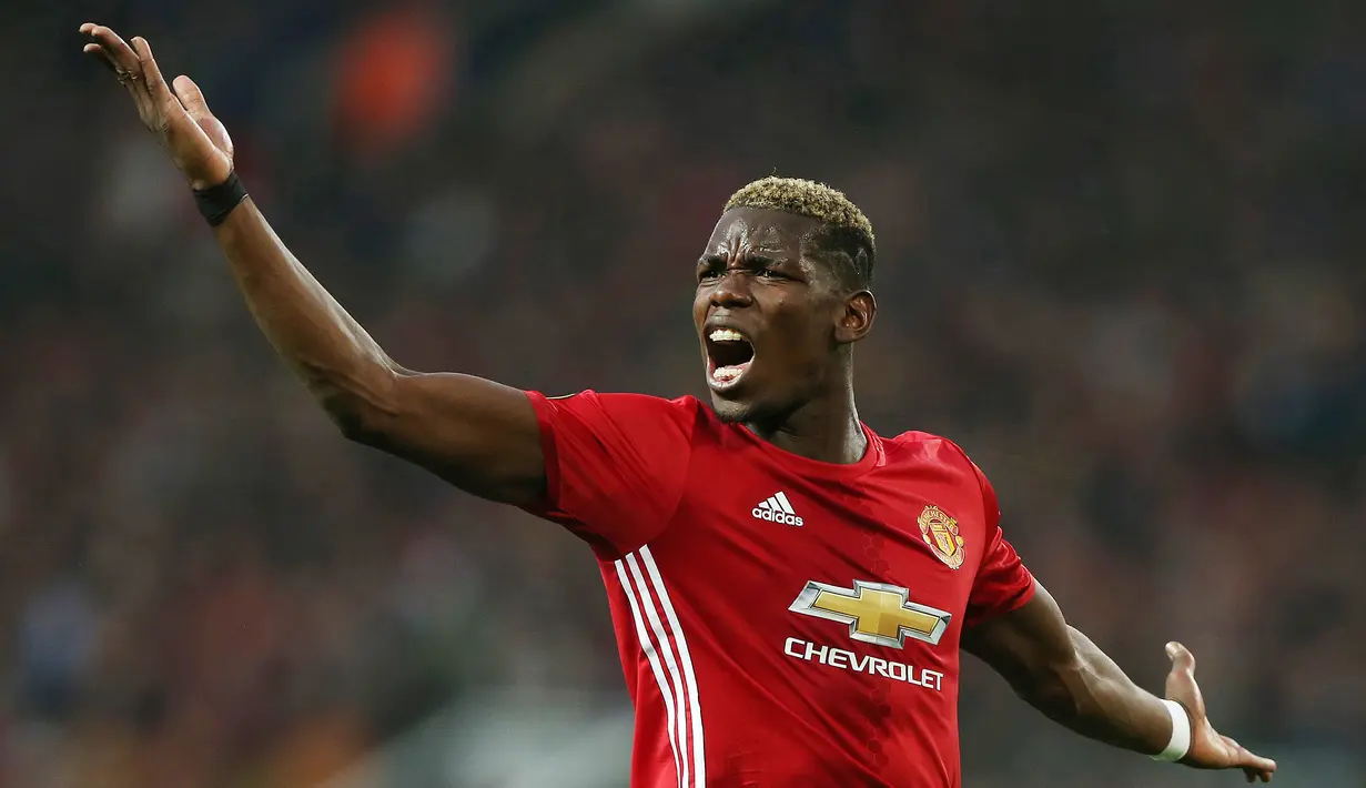 4. Paul Pogba - Pemain Timnas Prancis ini dikabarkan terinfeksi corona pada Kamis (27/8/2020). Akibatnya saat itu Pogba gagal memperkuat skuat asuhan Didier Deschamps untuk berlaga di UEFA Nations League 2020-2021. (EPA/Nigel Roddis)