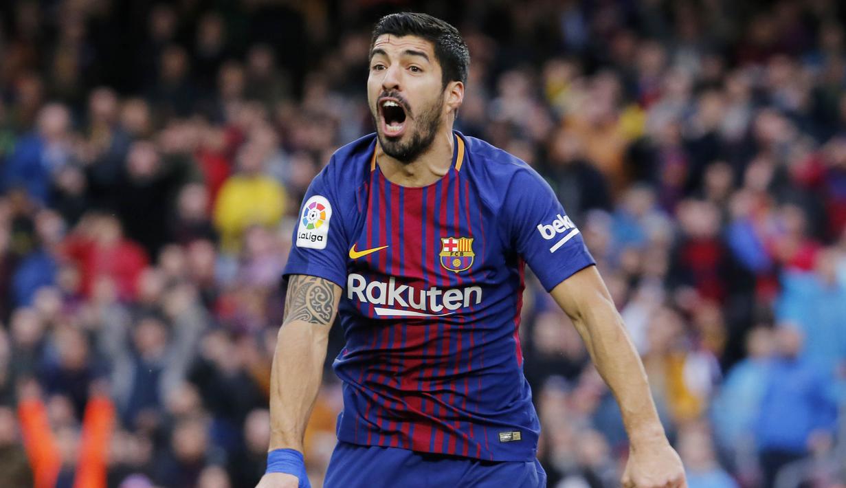 3. Luis Suarez (Barcelona) - 11 Gol (3 Penalti). (AFP/Pau Barrena)