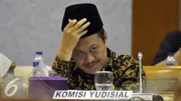 Ketua Komisi Yudisial (KY), Aidul Fitriciada Azhari saat mengikuti rapat koordinasi (Rakor) dengan Badan Legislasi (Baleg) DPR di Kompleks Parlemen, Jakarta, Selasa (24/5). Rapat tersebut membahas mengenai RUU Jabatan Hakim. (Liputan6.com/Johan Tallo)