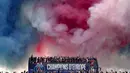 Parade juara kemudian ditutup dengan menyapa para pendukung di Stadion Parc des Princes. (Thibaud MORITZ/AFP)