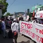 Organisasi ekstra kampus di Gorontalo saat melakukan aksi di depan Polda Gorontalo (Arfandi Ibrahim/Liputan6.com)
