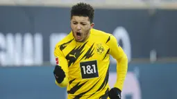 Jadon Sancho. Pemain sayap kiri berusia 21 tahun yang mulai musim ini berseragam Manchester United sebelumnya memperkuat Borussia Dortmund selama 4 musim. Tampil total 104 laga di Liga Jerman, ia mampu mencetak 38 gol yang membuat Setan Merah tertarik merekrutnya. (AFP/Pool/Leon Kuegeler)