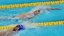 Perenang dari ESC Bandung, Ricky Anggawijaya saat melaju di lomba 200 meter gaya punggung putra Kejuaraan Aquatik Indonesia Open 2017 di Stadion Aquatik GBK, Jakarta, Jumat (15/12). Ricky mencatat waktu 02.04,75 detik. (Liputan6.com/Helmi Fithriansyah)