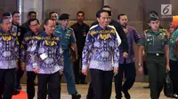 Presiden Jokowi (kanan) didampingi Ketua Umum HIPMI Bahlil Lahadalia saat menghadiri Sidang Dewan Pleno II dan Rapimnas HIPMI di Tangerang, Rabu (7/3). Rapimnas dihadiri lebih dari 2.000 peserta dari 34 provinsi di Indonesia. (Liputan6.com/Angga Yuniar)