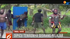 Dua kelompok warga bersenjata busur dan panah saling serang di jalan raya