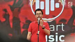 Deputy CEO Smartfren Djoko Tata Ibrahim memberikan sambutan saat peluncuran SmartMusic di Sarinah, Jakarta, Minggu (10/2). Aplikasi ini  untuk mendukung kemajuan industri kreatif khususnya bidang musik dalam negeri. (Merdeka.com/Iqbal S. Nugroho)
