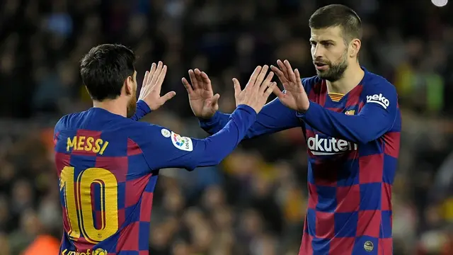 Lionel Messi dan Gerard Pique