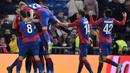 Para pemain CSKA Moskow merayakan gol yang dicetak Arnor Sigurdsson ke gawang Real Madrid pada laga Liga Champions di Stadion Santiago Bernabeu, Madrid, Rabu (12/12). Madrid kalah 0-3 dari CSKA. (AFP/Javier Soriano)