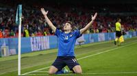Federico Chiesa melakukan selebrasi setelah mencetak gol pertama bagi timnya ketika pertandingan 16 besar Euro 2020 antara Italia melawan Austria yang berlangsung di Stadion Wembley, London, Inggris pada Sabtu (26/06/2021). (AP/Pool/Frank Augstein)