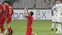Pemain tengah Timnas Indonesia, Evan Dimas Darmono merayakan gol yang dicetak Stefano Lilipaly saat melawan Timor Leste pada penyisihan grup B Piala AFF 2018 di Stadion GBK, Jakarta, Selasa (13/11). Indonesia unggul 3-1. (Liputan6.com/Helmi Fithriansyah)