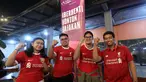 Anggota Komunitas penggemar Liverpool, Bigreds, melakukan selebrasi saat&nbsp;Roaring Night Premier League Liverpool vs Tottenham Hotspur di Park 15th Kemang, Jakarta Selatan, Minggu (5/5/2024). (Bola.com/M Iqbal Ichsan)