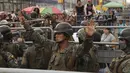 Presiden Guillermo Lasso memerintahkan militer dan polisi untuk mengambil alih kendali atas sistem penjara di Ekuador setelah terjadinya gelombang kekerasan. (AP Photo/Cesar Munoz)