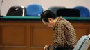 Terdakwa kasus kasus dugaan korupsi pelaksanaan kegiatan pertemuan dan konferensi internasional di Kemenlu tahun 2004-2005 itu pasrah saat Majelis Hakim membacakan vonis untuknya, Jakarta, Rabu, (23/7/14) (Liputan6.com/ Miftahul Hayat)
