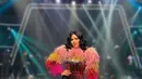 Begini penampakan Titi DJ saat mengenakan gaun hasil rancangannya sendiri. Serasi dengan bentuk tubuhnya yang langsing. (Foto: Instagram/@ti2dj)