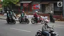 Pengendara sepeda motor memutar balik dan melawan arah di kawasan Lenteng Agung, Jakarta Selatan, Rabu (9/1/2019). Kurangnya pengawasan serta minim kesadaran tertib berlalu lintas menyebabkan sebagian pemotor nekat melawan arus. (Liputan6.com/Immanuel Antonius)