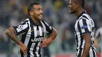 Patrice Evra dan Carlos Tevez dalam laga Juventus kontra Malmo (Marco Bertorello/AFP)