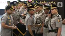 Kapolri Jenderal Idham Azis memimpin upacara sertijab Kepala Divisi Hubungan Internasional Polri dan sejumlah Kapolda di Rupatama Mabes Polri, Jakarta, Selasa (11/2/2020). Idham Azis memimpin 8 Kapolda yang dirotasi dan pejabat utama lain untuk melafalkan sumpah jabatan. (Liputan6.com/Johan Tallo)