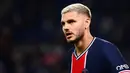 Mauro Icardi bisa dikatakan sebagai penyerang yang bagus di PSG. Ia tercatat mengoleksi 49 gol dari 66 pertandingan di semua laga bersama Le Parisien. Icardi berpeluang dilepas PSG karena kedatangan Messi akan menambah sesak lini serang mereka. (Foto: AFP/Patricia De Melo Moriera)