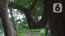 Spanduk pemberitahuan penutupan dipasang di area Taman Menteng, Jakarta, Selasa (3/11/2020). Masih tingginya kasus covid-19 menyebabkan sejumlah fasilitas umum dan fasilitas sosial di Ibu Kota belum beroperasi normal sejak ditutup selama beberapa bulan lalu. (Liputan6.com/Immanuel Antonius)