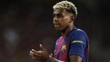 Reaksi penyerang Barcelona Spanyol #10, Lamine Yamal, selama pertandingan phase league match 2 Liga Champions antara FC Barcelona dan Paris Saint-Germain (PSG) di Estadi Olimpic Lluis Companys di Barcelona, ​​pada 1 Oktober 2025. (Josep LAGO/AFP)