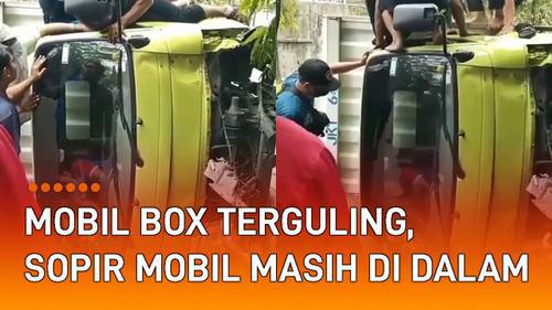 VIDEO: Mobil Box Terguling di Jalan, Sopir Mobil Masih Berada di Dalamnya