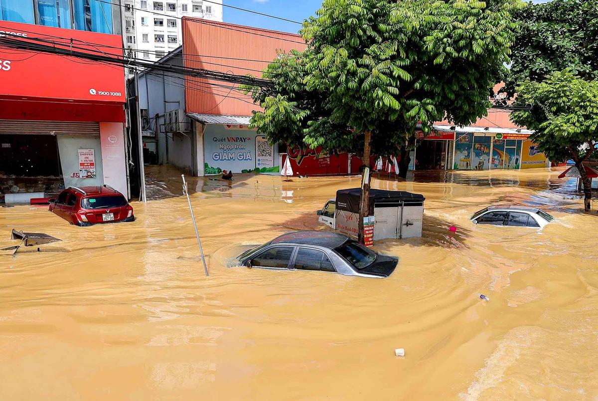 FOTO: Topan Matmo Luluhlantakkan Vietnam Utara, Banjir Terburuk dalam 60 Tahun