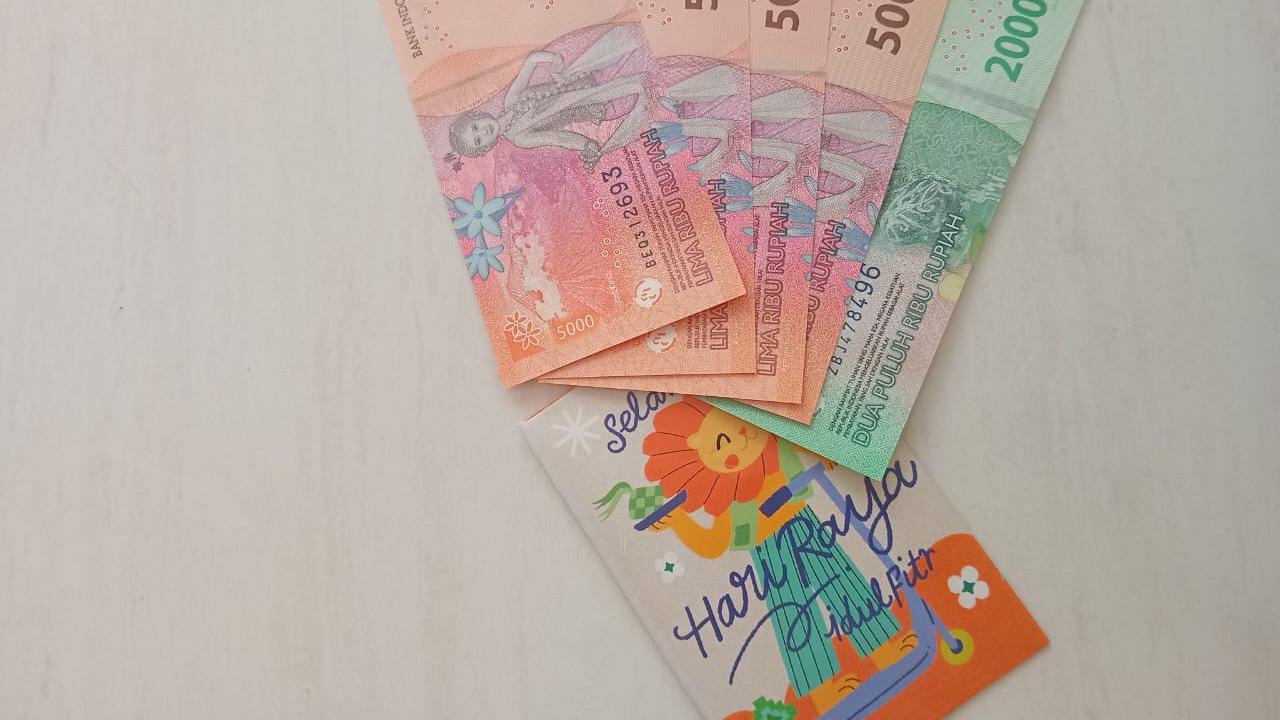 THR Lebaran Anak Pakai Uang Baru (Foto: Benedikta Desideria/Liputan6.com)