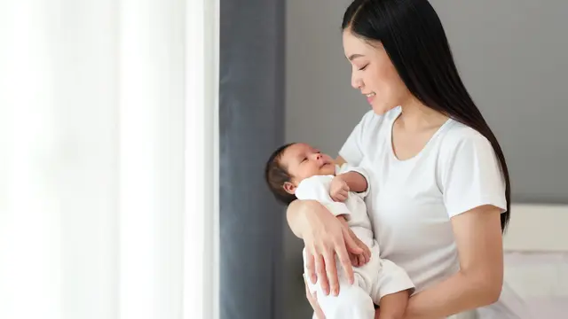 keluarga desember bayi tidur