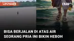 Aksi seorang pria bisa berjalan di atas air mengundang perhatian