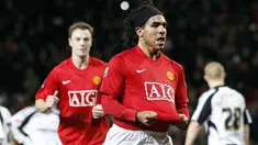 Manchester United's forward Carlos T&eacute;vez celebrates after scoring during the second leg of their English League Cup semi final against Derby County at Old Trafford in Manchester, on January 20, 2009. AFP PHOTO/PAUL ELLIS