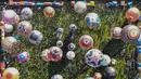 Festival balon udara di Wonosobo, Jawa Tengah selalu menarik perhatian masyarakat, dengan jumlah pengunjung yang mencapai ribuan orang. (DEVI RAHMAN/AFP)