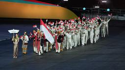 Kontingen Merah Putih yang berjumlah 69 atlet dari enam cabang olahraga yang mewakili Tim Indonesia di Opening Ceremony SEA Games Thailand 2025 yang digelar di Rajamanggala Stadium pada Selasa (9/12/2025) malam WIB. (Dok. NOC Indonesia)