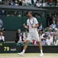 Marin Cilic rayakan kemenangan atas Sam Querrey pada semifinal Wimbledon, Jumat (14/7/2017). Cilic menang 6-7(6), 6-4, 7-6(3), 7-5. (AFP/Adrian Dennis)