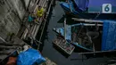 Anak-anak bermain di kawasan Kampung Akuarium, Jakarta, Selasa (17/2/2021). Badan Pusat Statistik (BPS) mengungkapkan jumlah penduduk miskin Indonesia pada September 2020 mencapai 27,55 juta orang, meningkat 2,76 juta dibandingkan posisi September 2019. (Liputan6.com/Faizal Fanani)