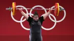 Lifter Indonesia Nurul Akmal berlaga pada cabang angkat besi +87 kg putri Olimpiade Tokyo 2020 di Tokyo, Jepang, Senin (2/8/2021). Nurul Akmal gagal mempersembahkan medali untuk Indonesia. (AP Photo/Luca Bruno)