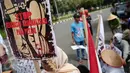 Peserta aksi membawa spanduk bertuliskan "Stop Kekerasan Kriminalisasi Pada Petani' di depan Mahkamah Agung, Jakarta, Kamis (2/6/2016). Dalam aksinya, massa menuntut pemerintahan Jokowi untuk menyelesaikan konflik Agraria. (Liputan6.com/Faizal Fanani)