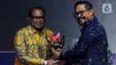 Pemerintah Kabupaten Kutai Timur menerima penghargaan dalam kategori Program Desa Wisata dalam ajang Merdeka Awards 2023. Penghargaan ini diterima oleh Wakil Bupati Kutai Timur Kasmidi Bulang. (merdeka.com/Imam Buhori)