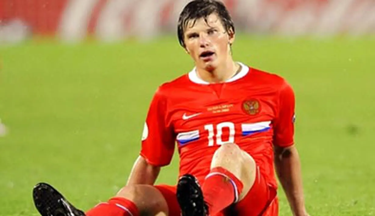 Russian forward Andrei Arshavin reacts on the pitch at the end of the Euro 2008 championships semi-final football match Russia vs. Spain on June 26, 2008 at Ernst-Happel stadium in Vienna, Austria. AFP PHOTO / FRANCK FIFE