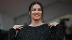 Adriana Lima berpose saat karpet merah film "The Killer" yang dipersembahkan dalam kompetisi Festival Film Venesia ke-80 di Venice Lido, Minggu (3/9/2023). (Photo by Tiziana FABI / AFP)