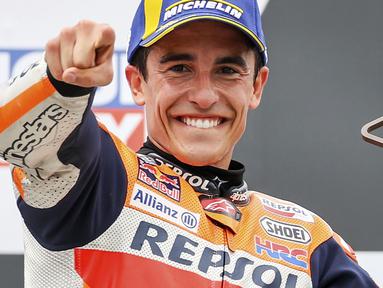 Pembalap Marc Marquez bereaksi setelah memenangkan balapan MotoGP di Sirkuit Sachsenring, Hohenstein-Ernstthal, Jerman, Minggu (20/6/2021). Marc Marquez mempertegas status sebagai raja Sachsenring usai memenangkan MotoGP Jerman 2021. (Jan Woitas/dpa via AP)