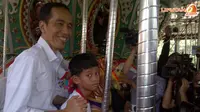 Senyum Jokowi Saat Naik Komidi Putar Dufan