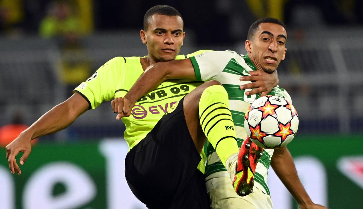 Bermain di hadapan publik sendiri, klub yang berjuluk Die Borussen tersebut harus menhadapi perlawanan sengit dari Sporting Lisbon. (AFP/Ina Fassbender)