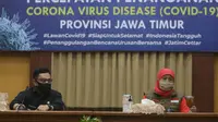 Konferensi pers perkembangan kasus virus corona baru yang memicu COVID-19 di Gedung Grahadi, Selasa (19/5/2020) (Foto: Liputan6.com/Dian Kurniawan)
