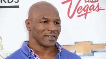 Mike Tyson merupakan mantan atlet tinju yang sangat disegani oleh lawan – lawannya, kehidupannya yang  mewah kini telah sirna. Menurut The New York Times, utang Tyson mencapai Rp 207 miliar, belum dengan pajak lainnya. (AFP/JASON MERRITT) 